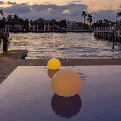 Flatball Floating Bluetooth Outdoor LED Lamp in Outside Area.