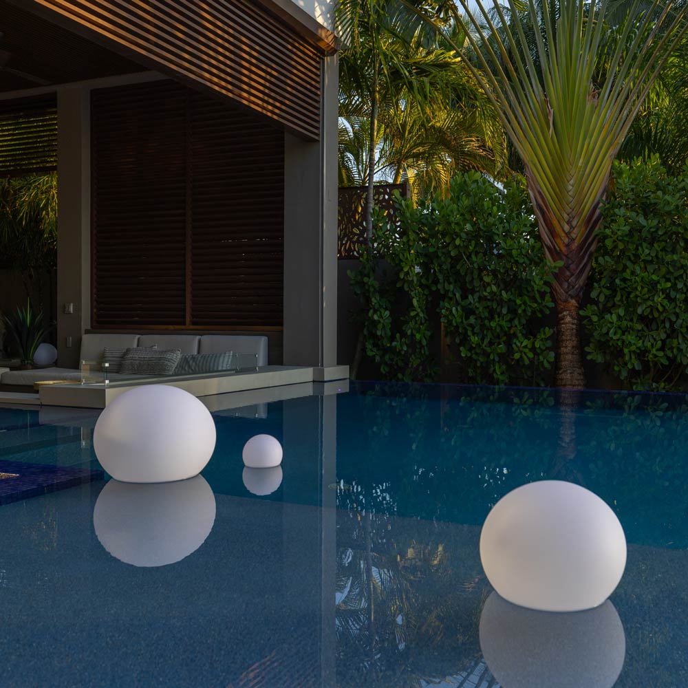 Flatball Floating Bluetooth Outdoor LED Lamp in Outside Area.