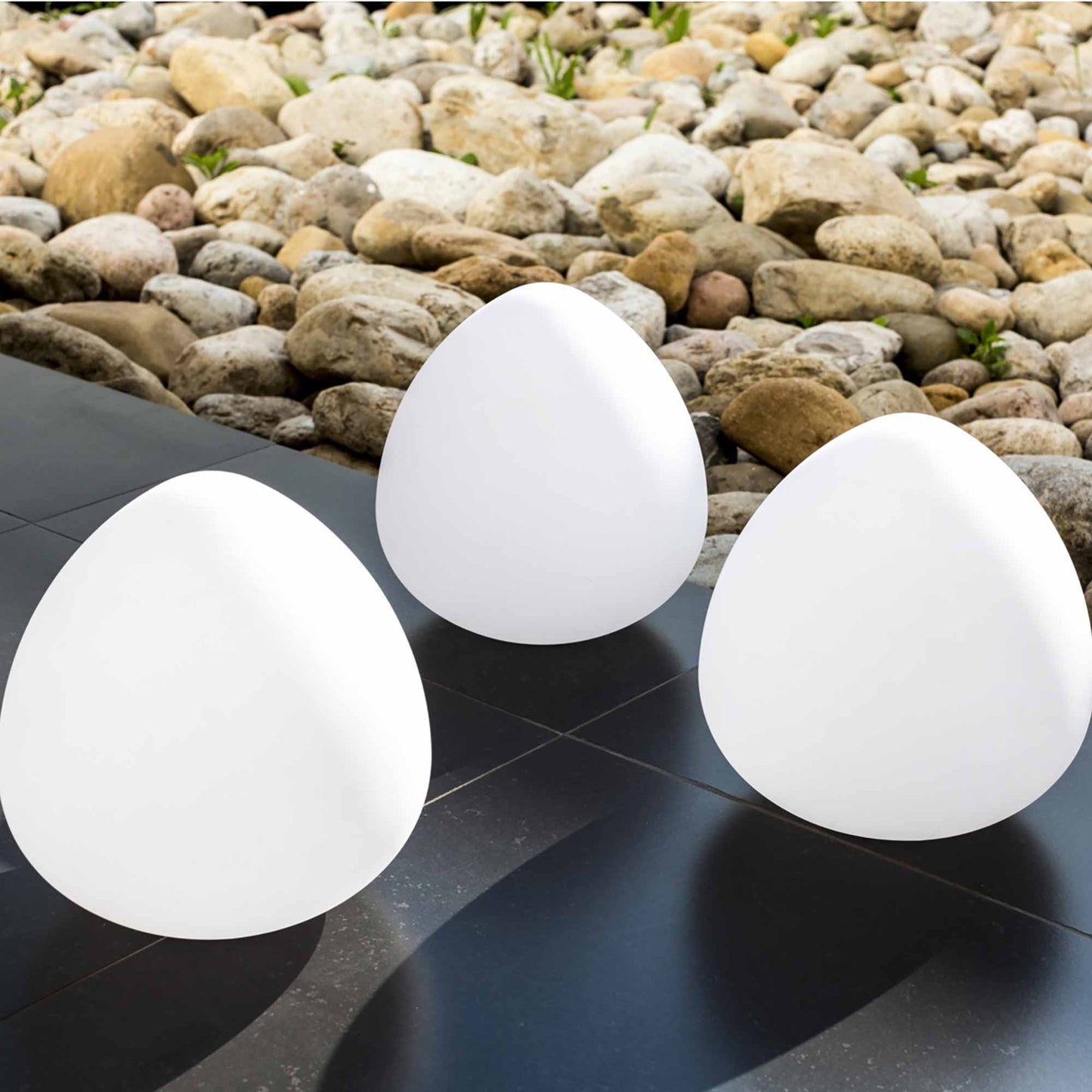 Rock Bluetooth Outdoor LED Table Lamp in Outside Area.