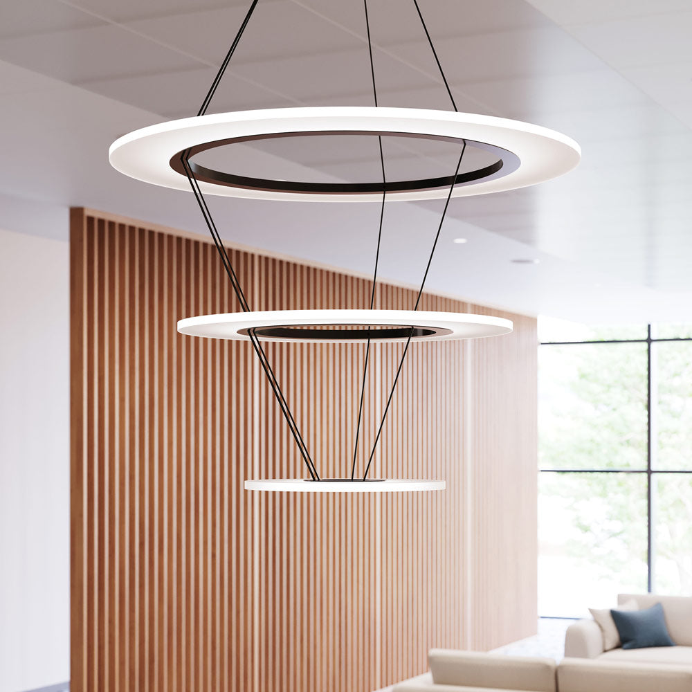 Arctic Rings™ Triple Ring LED Pendant Light in living room.