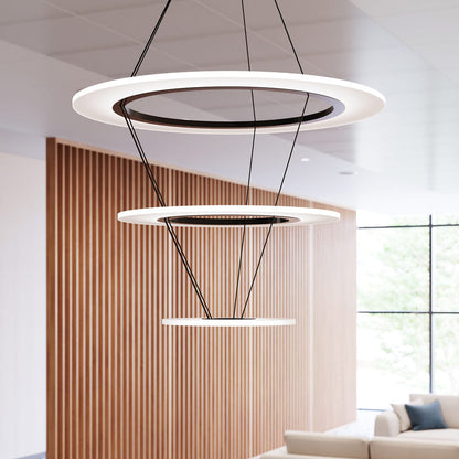 Arctic Rings™ Triple Ring LED Pendant Light in living room.