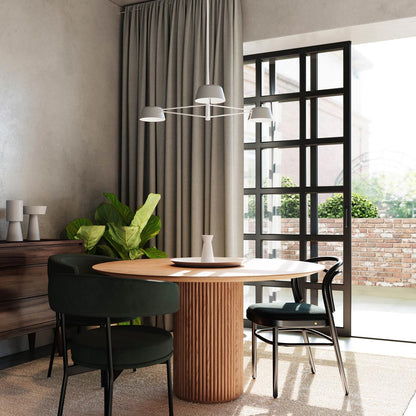 Ray LED Chandelier in dining room.