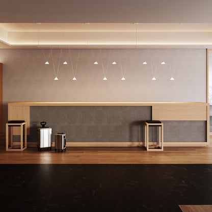 Suspenders® 1-Tier Linear Etched Glass Cone LED Chandelier in dining room.