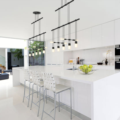 Suspenders® Tier Linear LED Pendant Light in dining room.