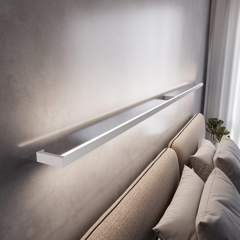 Thin-Line™ LED Wall Light in bedroom.