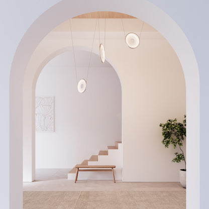 Yo Coin LED Pendant Light in hallway.