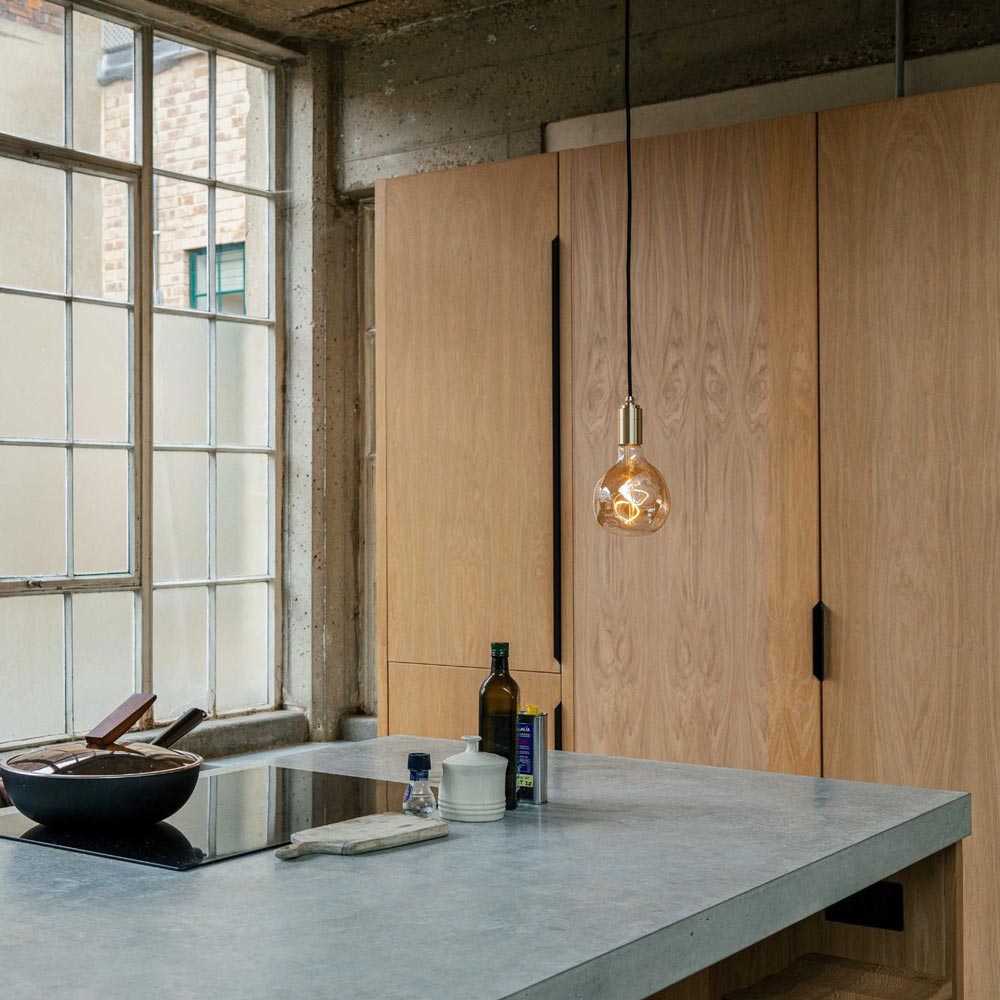 Cylindrical Pendant Light in kitchen.