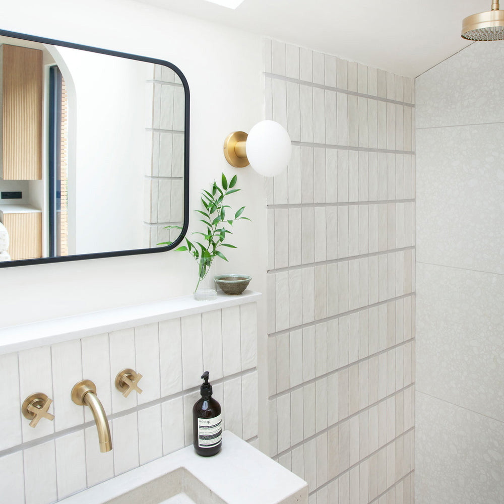 Lochan Oval Outdoor Wall Light in bathroom.