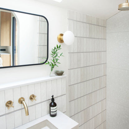 Lochan Oval Outdoor Wall Light in bathroom.