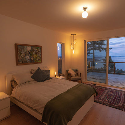 Lochan Sphere III Outdoor Wall Light in bedroom.