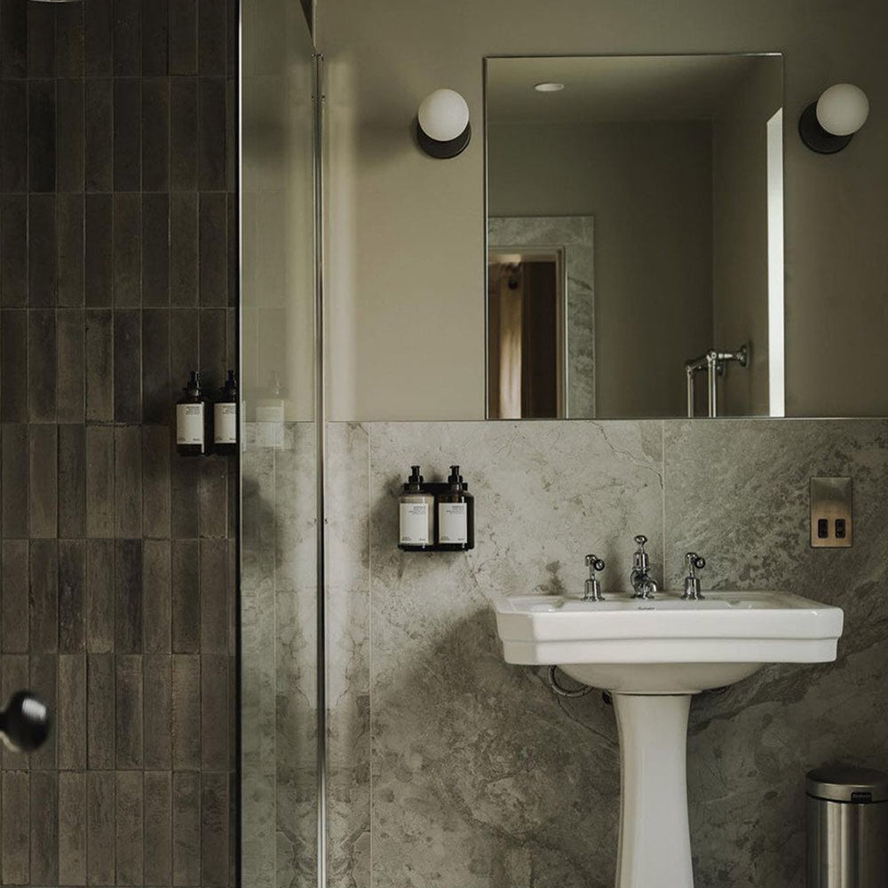 Lochan Sphere III Outdoor Wall Light in bathroom.