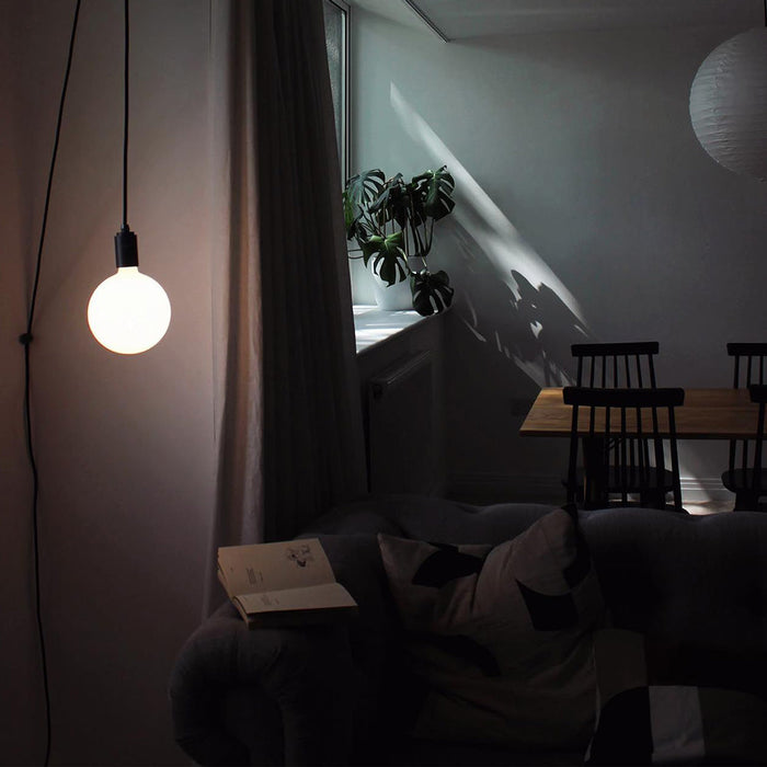 Sphere IV Plug-In Pendant Light in living room.