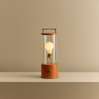 The Muse 2.0 Portable Table Lamp in Claycourt Orange.