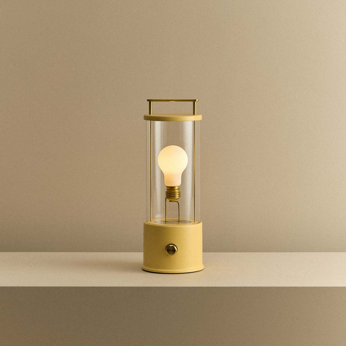 The Muse 2.0 Portable Table Lamp in Posset Yellow.