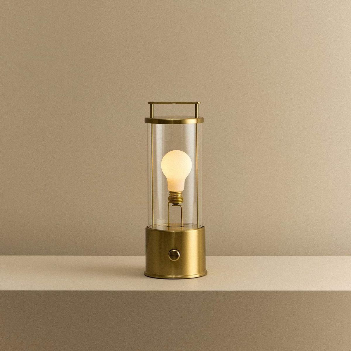 The Muse 2.0 Portable Table Lamp in Solid Brass.
