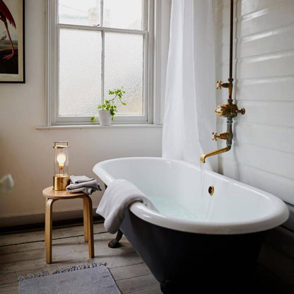 The Muse 2.0 Portable Table Lamp in bathroom.
