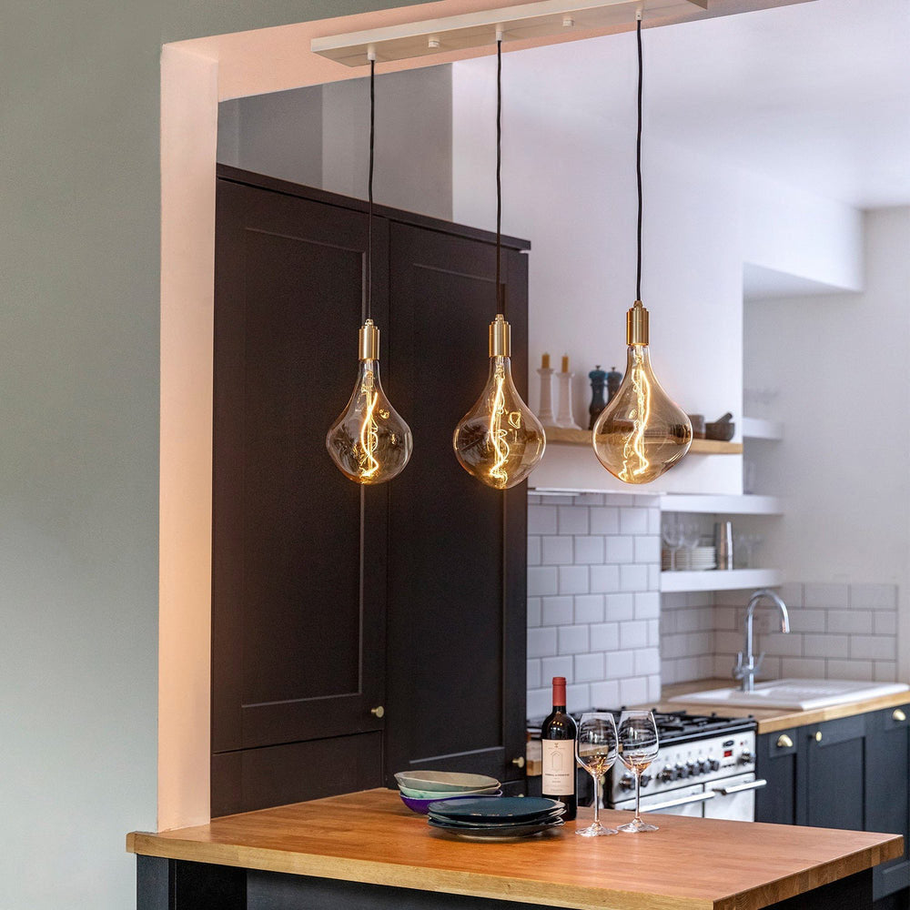 Voronoi II LED Linear Triple Pendant Light in dining room.