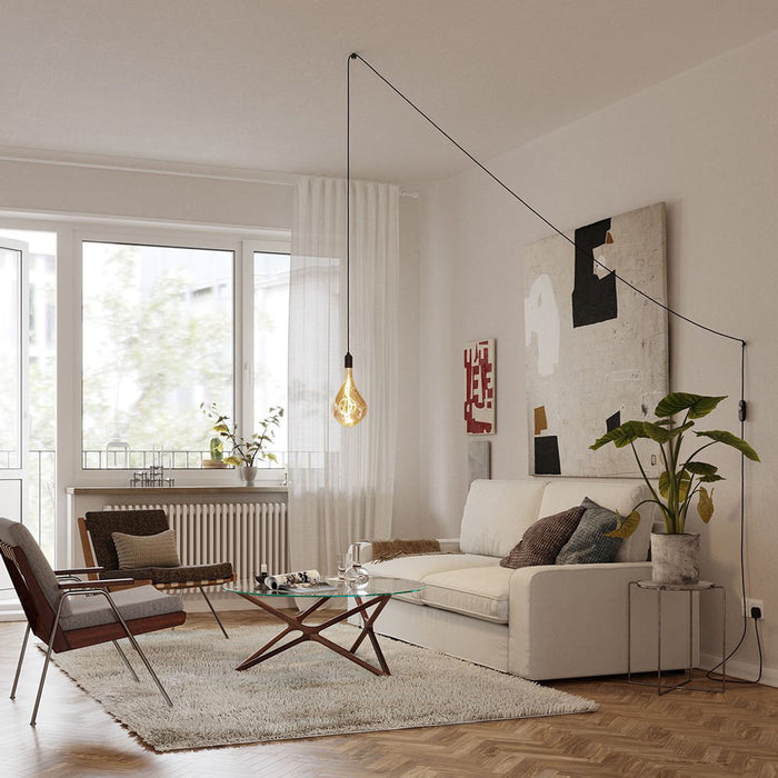 Voronoi III Plug-In Pendant Light in living room.