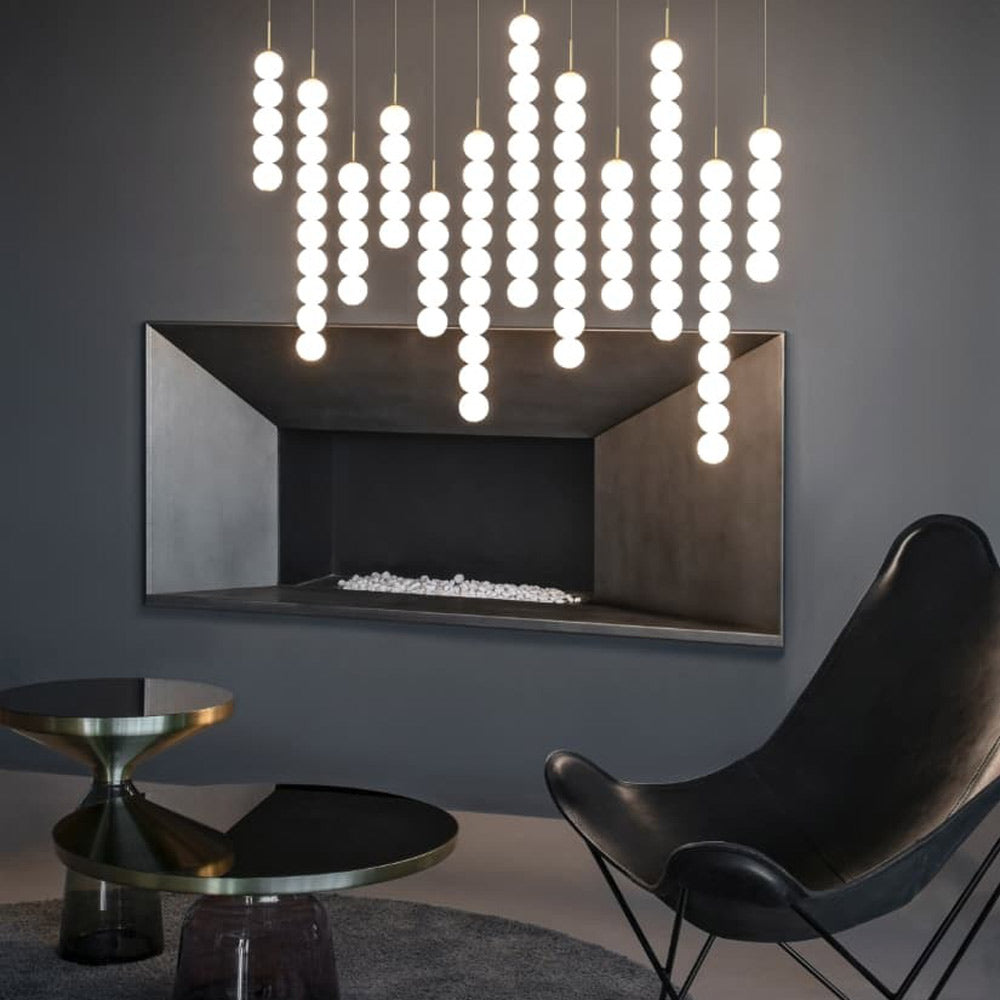 Abacus Linear LED Pendant Light in living room.