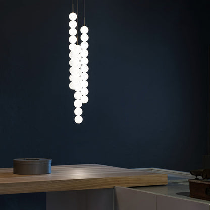 Abacus Round Multi Light LED Pendant Light in living room.