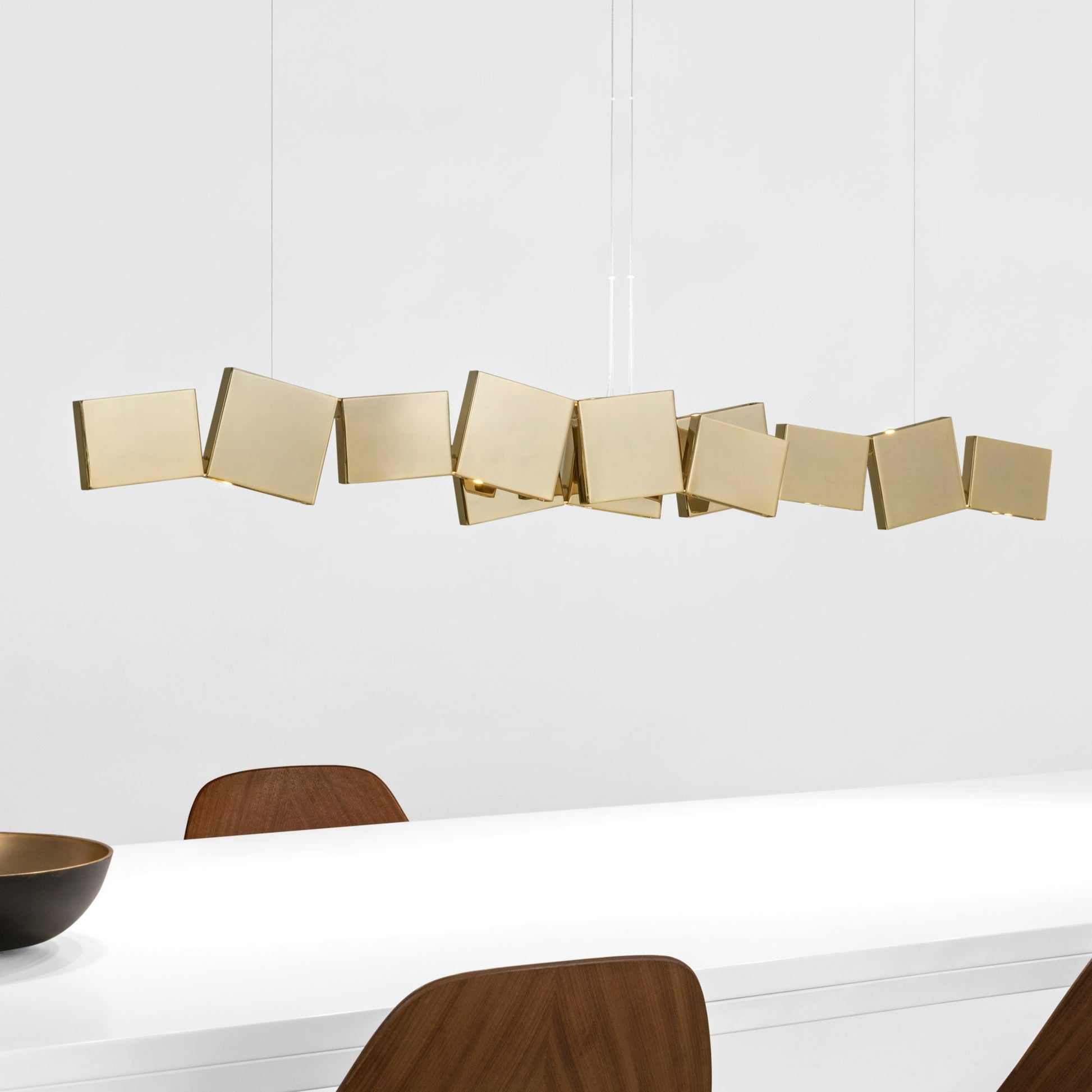 Gaia Double Linear LED Chandelier in dining room.