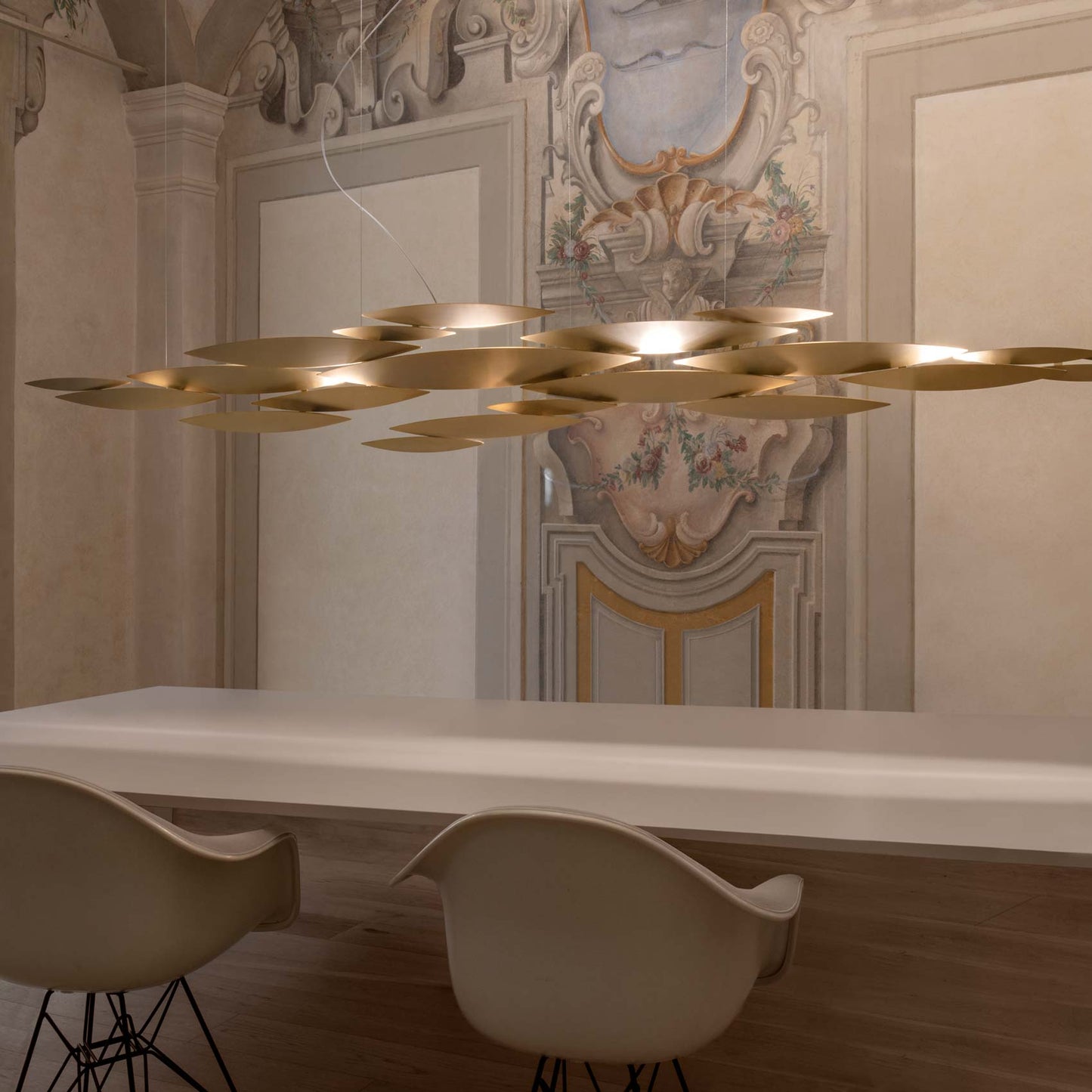 I Lucci Argentati Linear LED Chandelier in dining room.