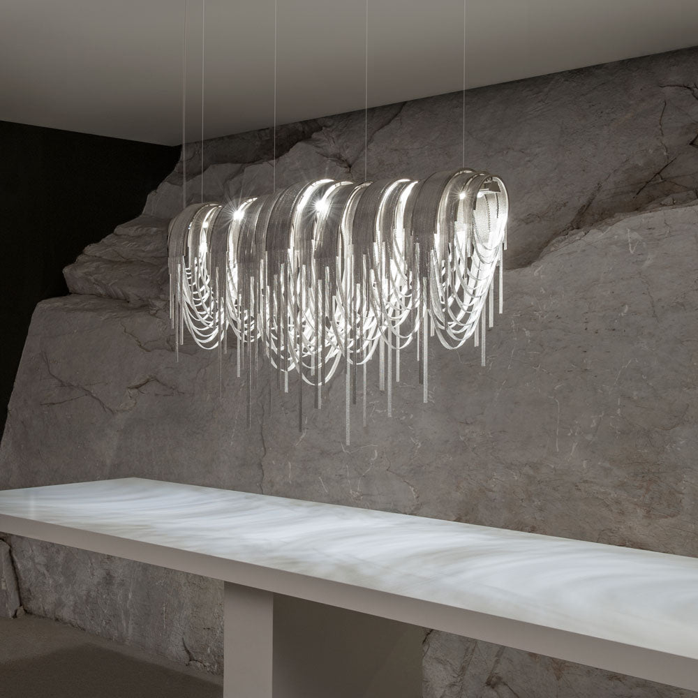 Volver Linear LED Chandelier in dining room.