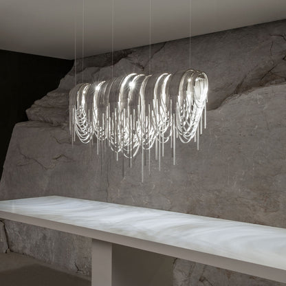 Volver Linear LED Chandelier in dining room.