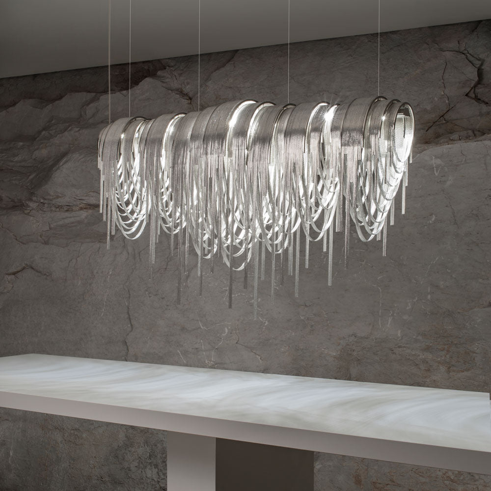 Volver Linear LED Chandelier in dining room.