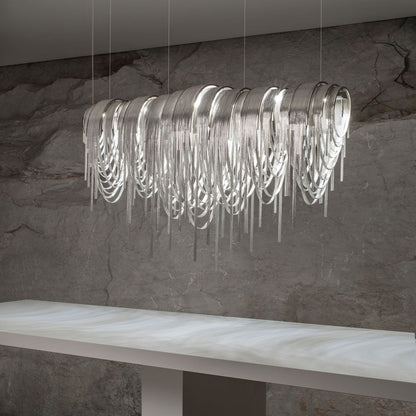 Volver Linear LED Chandelier in dining room.