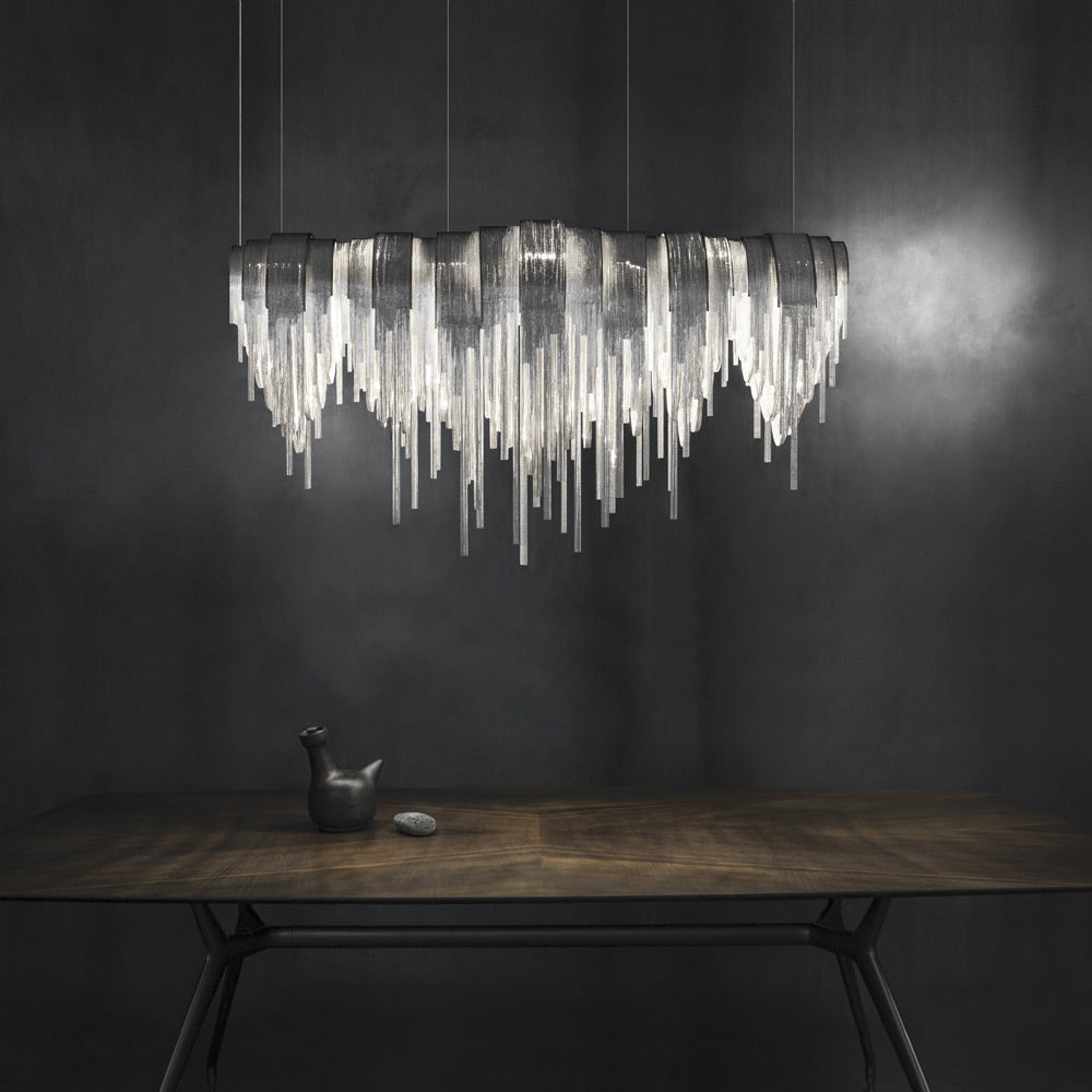 Volver Linear LED Chandelier in dining room.