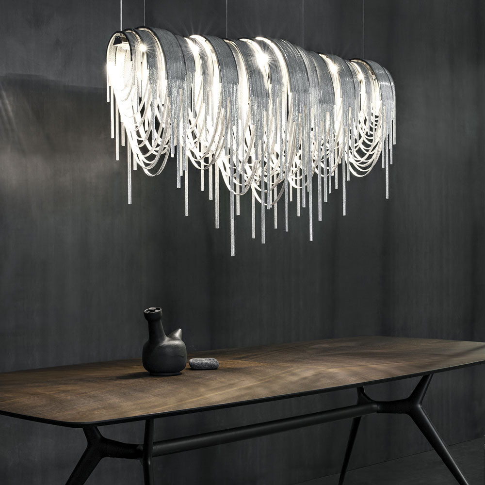 Volver Linear LED Chandelier in dining room.