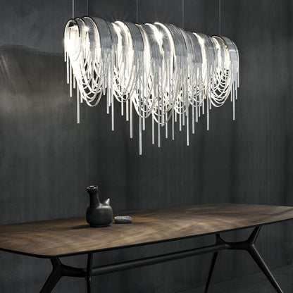 Volver Linear LED Chandelier in dining room.