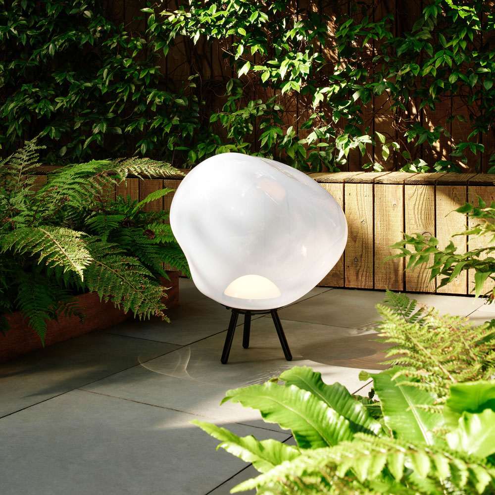 Melt Portable LED Floor Lamp in Outside Area.