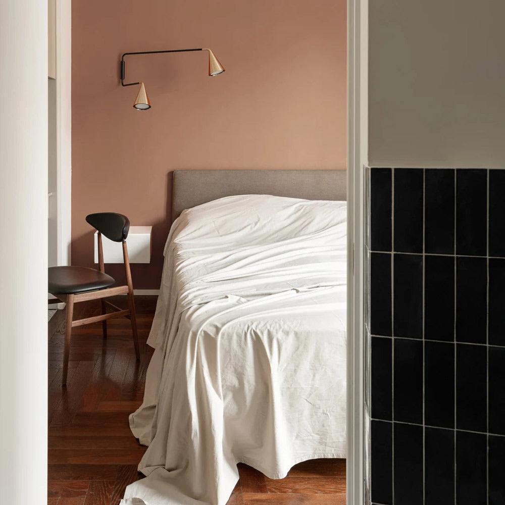 Gordon 2-Light Orientable Wall Light in bedroom.