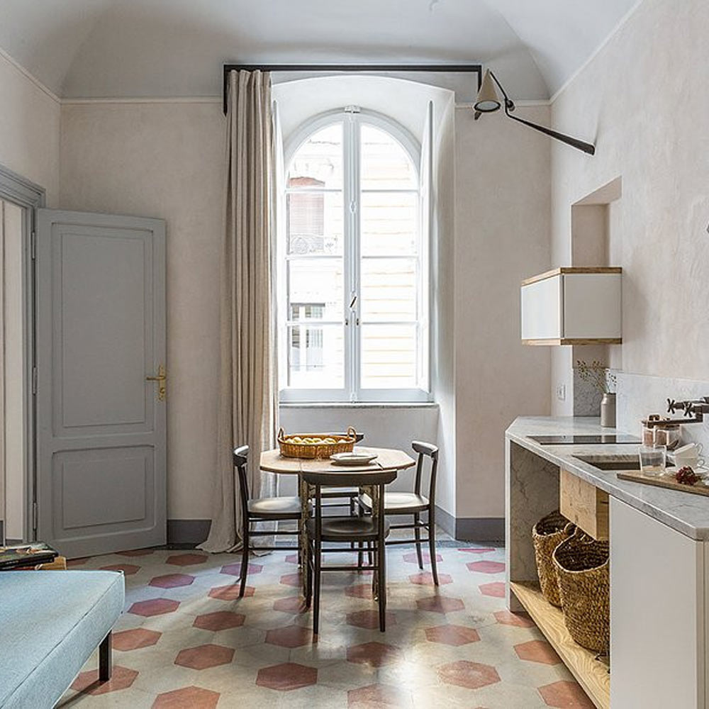 Gordon Adjustable Wall Light in dining room.