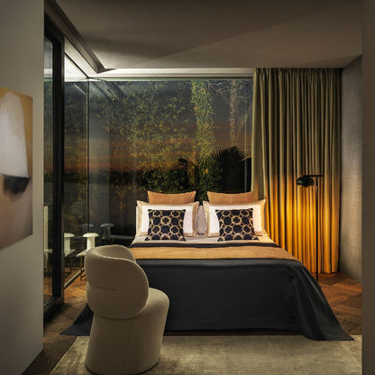 Molly LED Floor Lamp in bedroom.