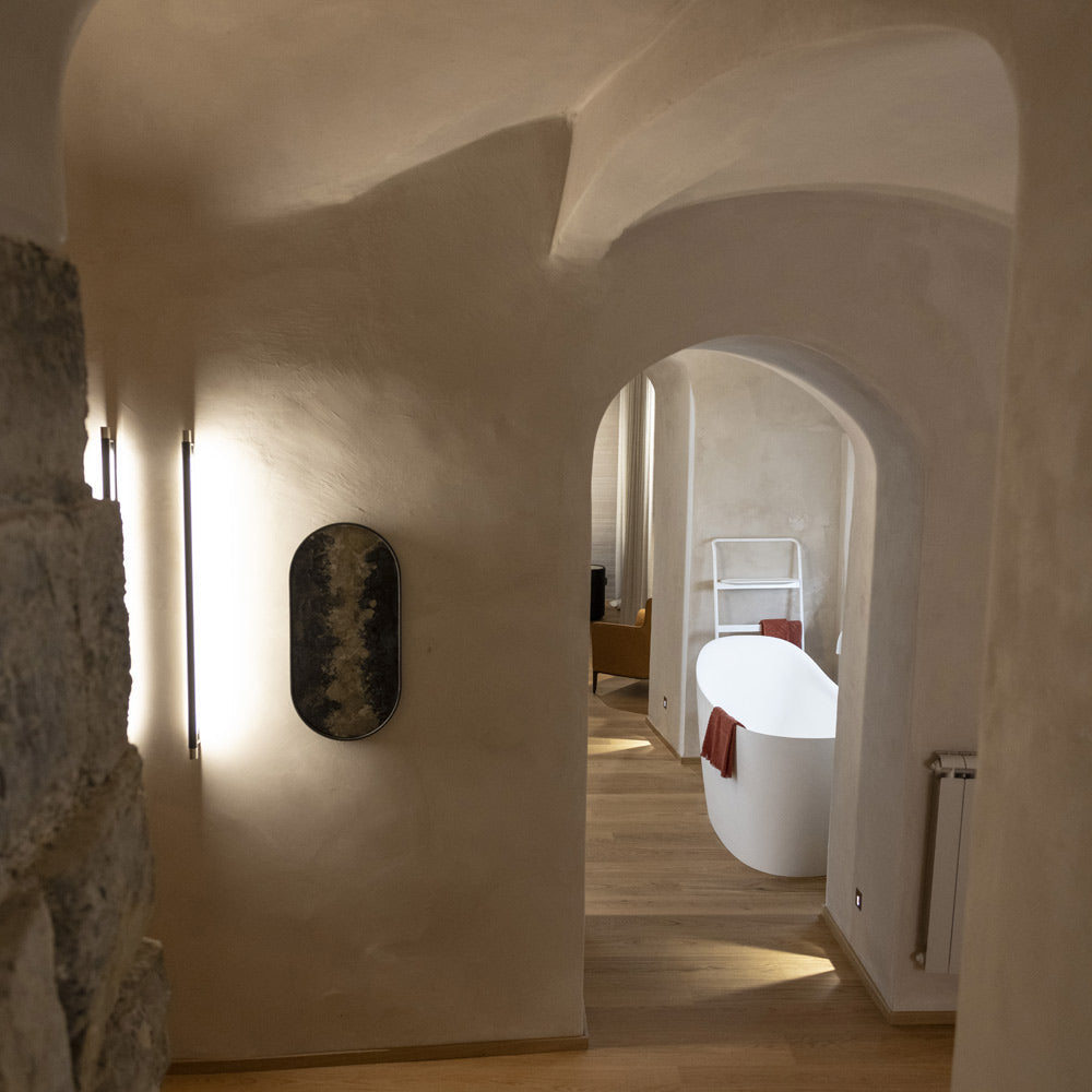 Thula Orientable LED Wall Light in bathroom.