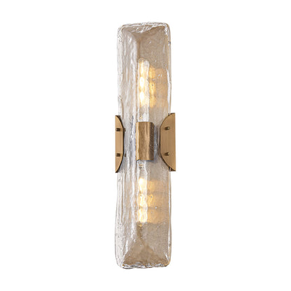 Nordic Wall Light in Patina Brass (24-Inch).