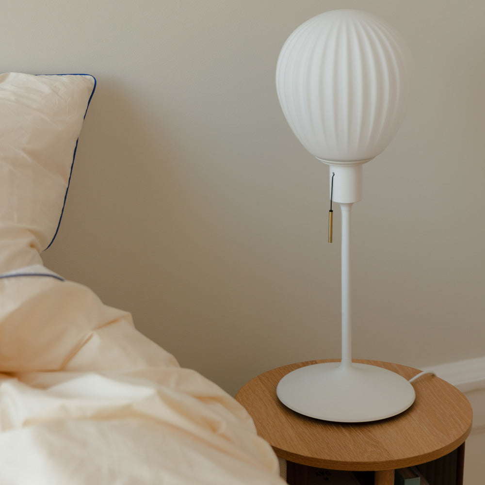 Around The World Table Lamp in bedroom.