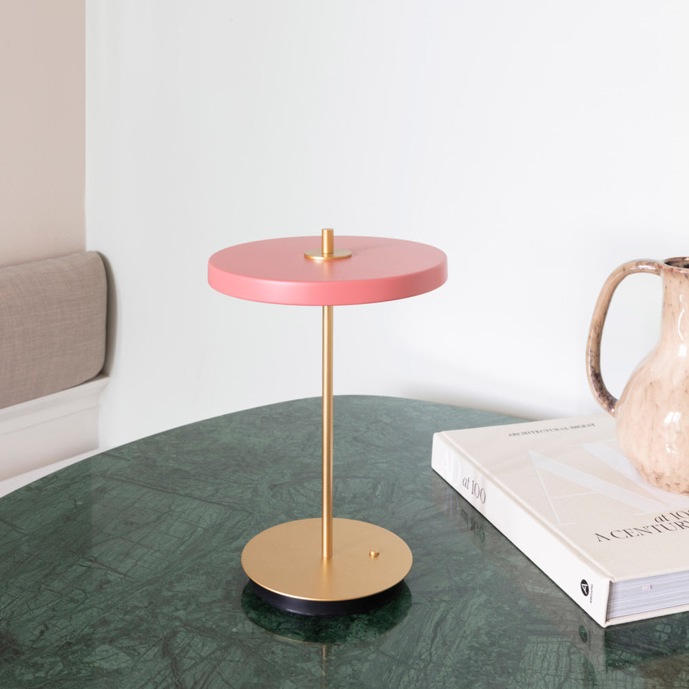 Asteria Move LED Portable Table Lamp in living room.
