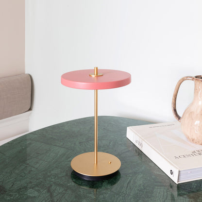 Asteria Move LED Portable Table Lamp in living room.
