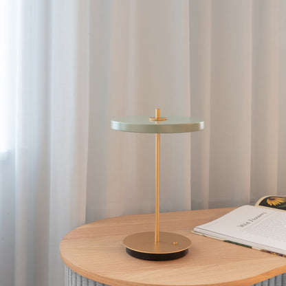 Asteria Move LED Portable Table Lamp in living room.