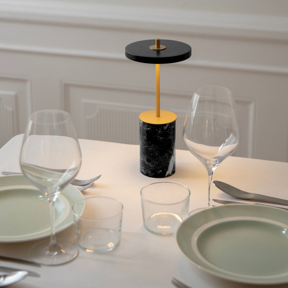 Asteria Move Mini LED Portable Table Lamp in dining room.
