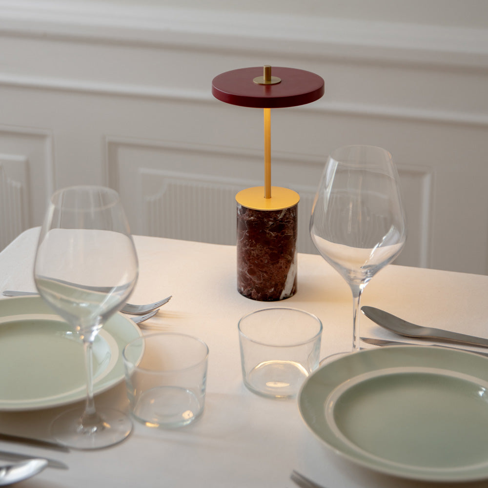 Asteria Move Mini LED Portable Table Lamp in dining room.