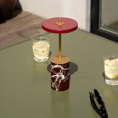 Asteria Move Mini LED Portable Table Lamp in living room.