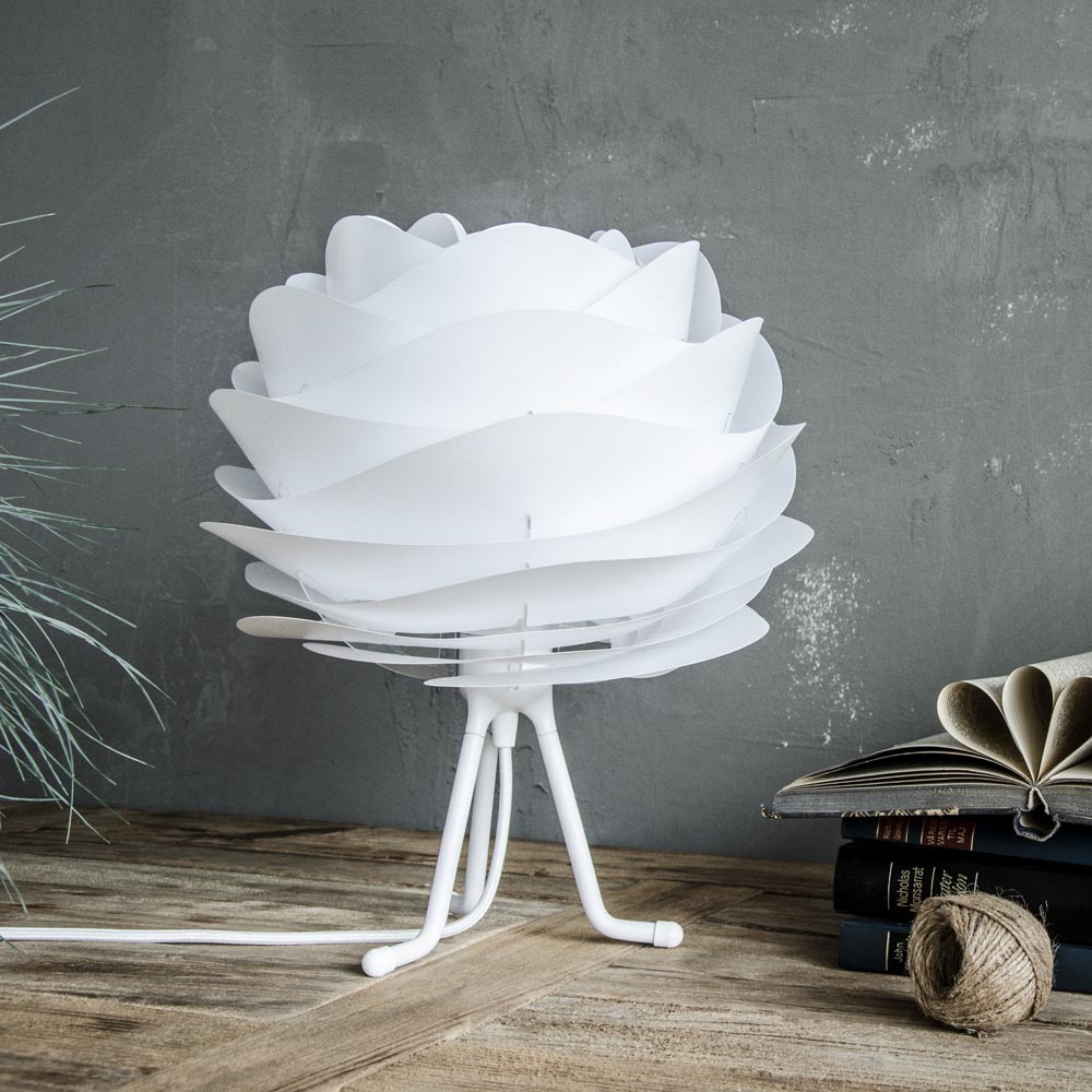 Carmina Adjustable Tripod Table Lamp in living room.