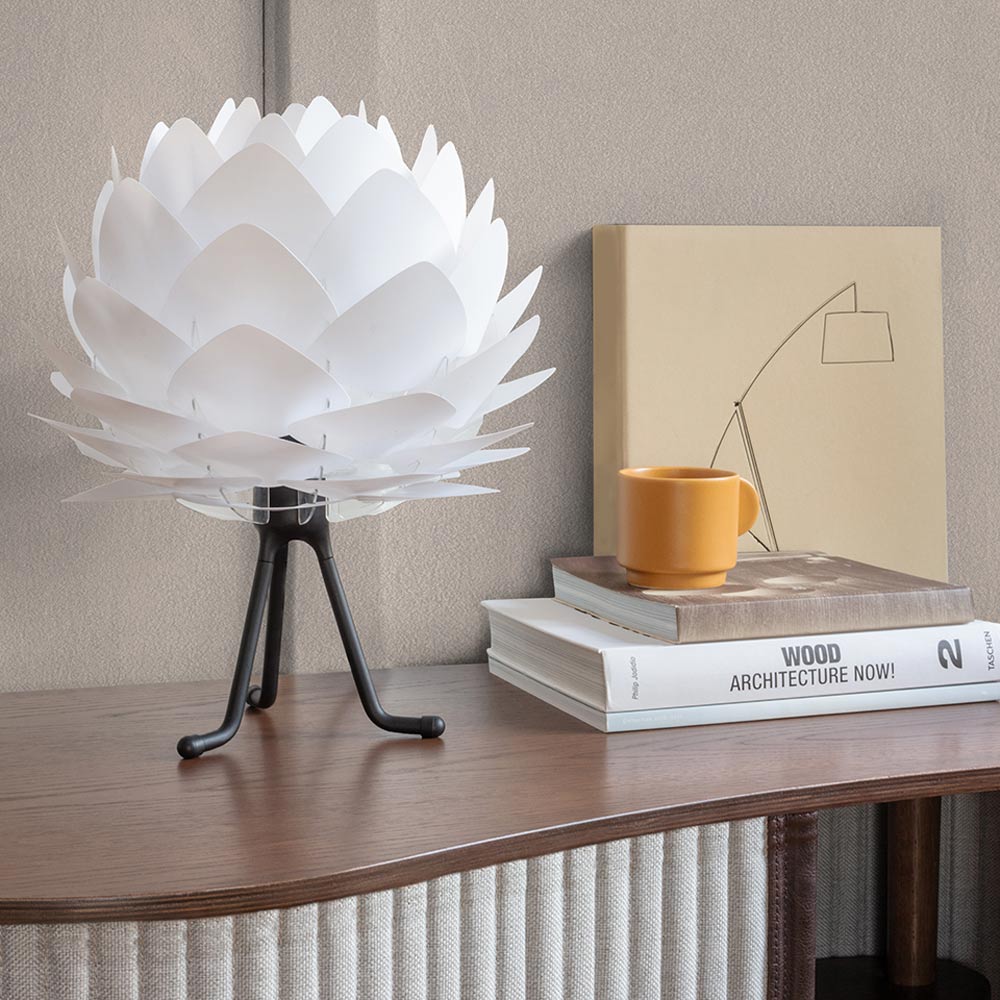 Carmina Adjustable Tripod Table Lamp in living room.