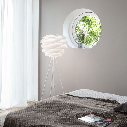 Carmina Tripod Floor Lamp in bedroom.