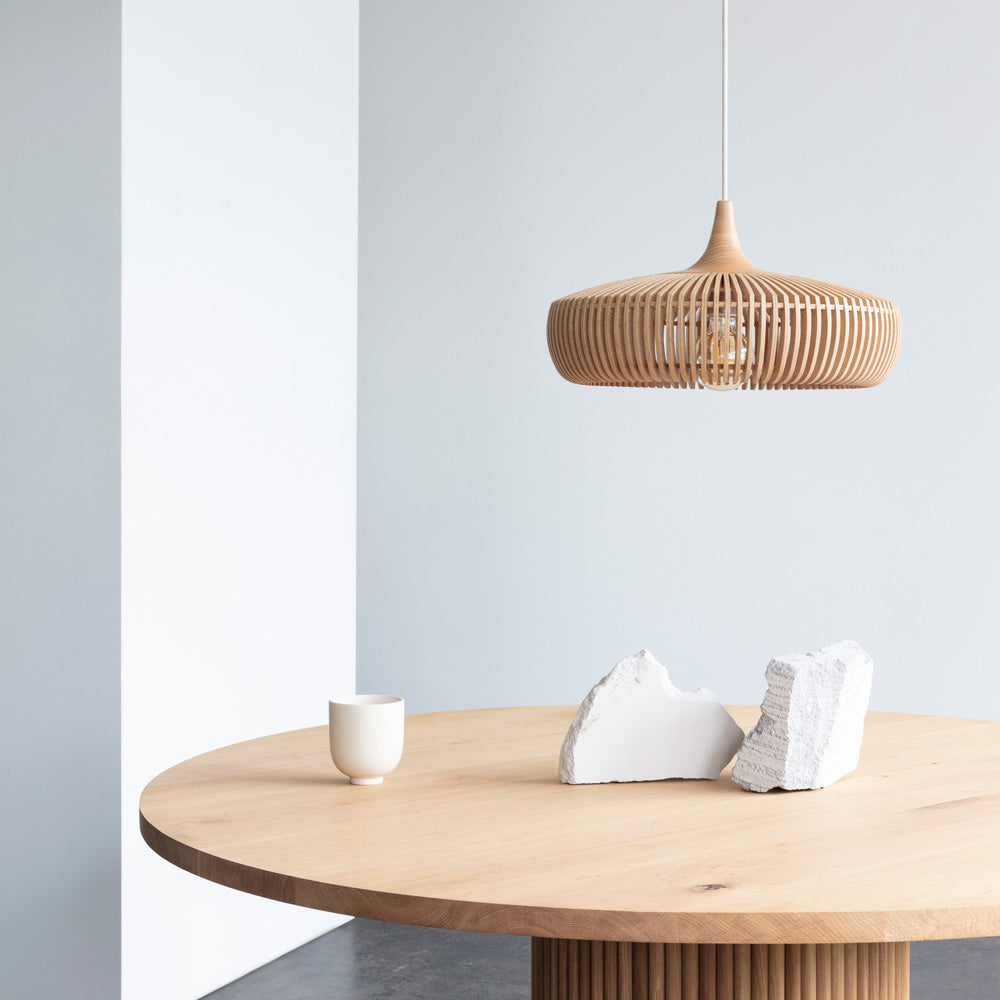 Clava Dine Wood Pendant Light in dining room.